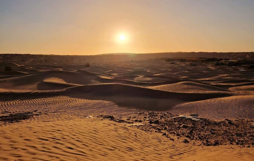 Tramonto sulle dune del Sahara durante il viaggio Capodanno Wild Sahara con AF Travel Firenze